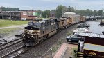 NS 7565 passes the caboose.